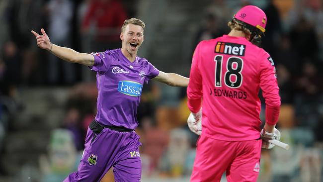 Riley Meredith of the Hurricanes celebrates taking the wicket of Jack Edwards of the Sixers during the Big Bash League match between the Hobart Hurricanes and Sydney Sixers at Blundstone Arena, on December 10, 2020, in Hobart, Australia. (Photo by Matt King/Getty Images)