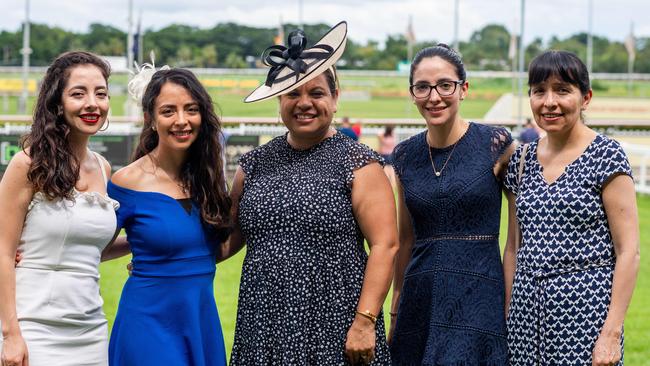 Evelyn Maybury, Katherine Bayas, Ivone Byrne, Natalie Bayas and Yolanda Valencia celebrate Australia Day at the Darwin Turf Club. Picture: Che Chorley