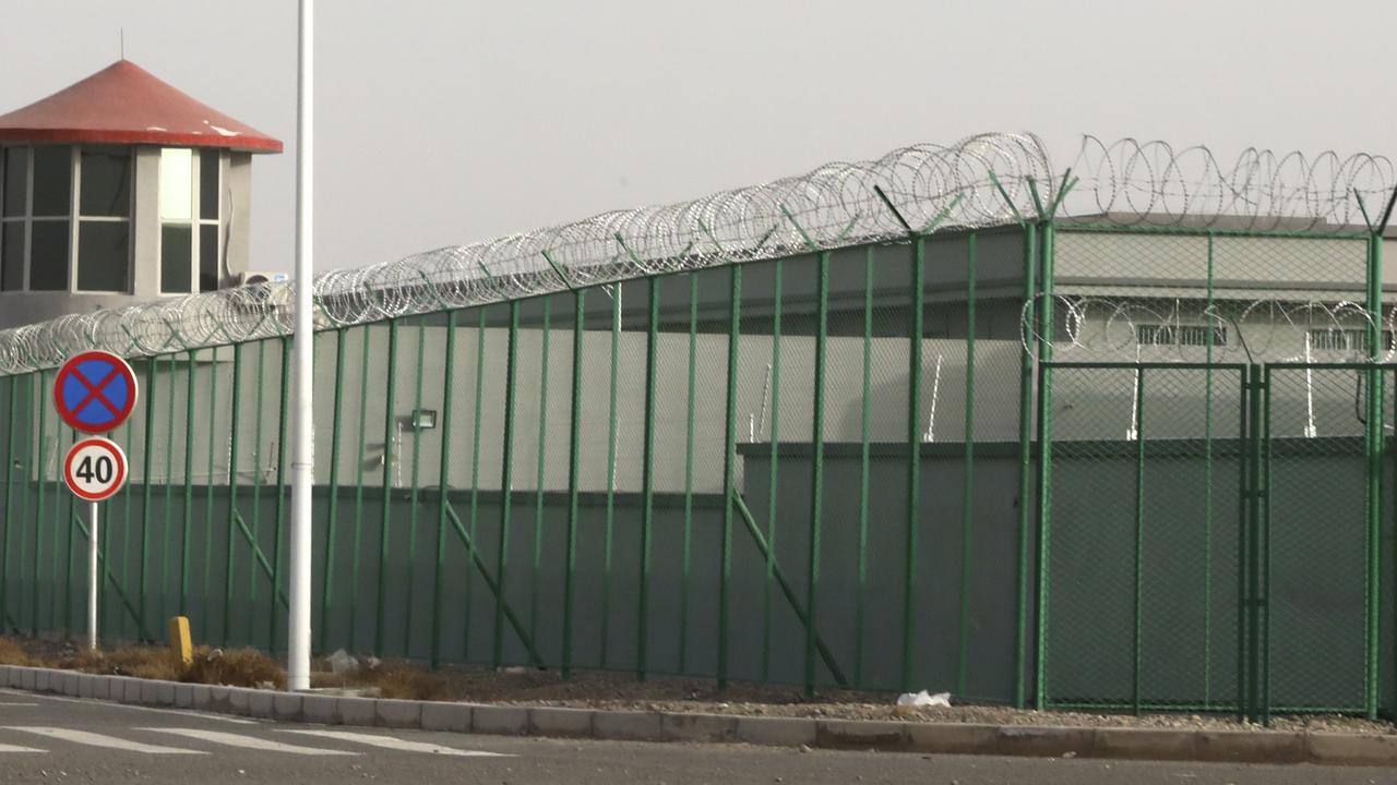 China says its Muslim detention camps are like boarding schools. Picture: AP Photo/Ng Han Guan