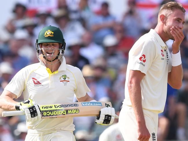 Australian captain Steve Smith smiles as he scores more runs off Stuart Broad.