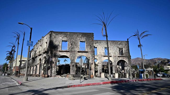 A building that once housed restaurants and coffee shops among other businesses is seen destroyed by the Palisades Fire in Pacific Palisades, California. Picture: AFP