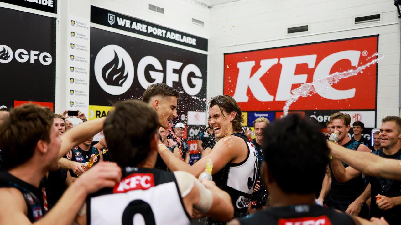 Ollie Lord was rewarded with a Gatorade shower in the rooms afterwards. (Photo by James Elsby/AFL Photos via Getty Images)