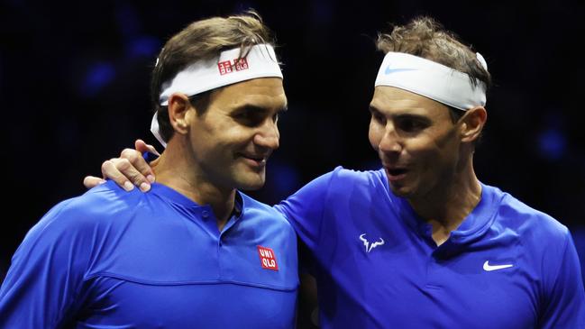 LONDON, ENGLAND - SEPTEMBER 23: Roger Federer and Rafael Nadal of Team Europe interact during the doubles match between Jack Sock and Frances Tiafoe of Team World and Roger Federer and Rafael Nadal of Team Europe during Day One of the Laver Cup at The O2 Arena on September 23, 2022 in London, England. (Photo by Clive Brunskill/Getty Images for Laver Cup)