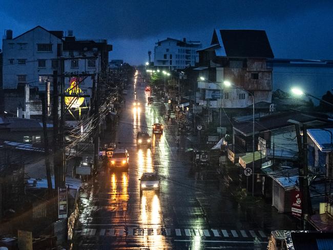 Rain covers the city lying on the path of Typhoon Mangkhut as residents prepare its approach on September 14. Picture: Jes Aznar