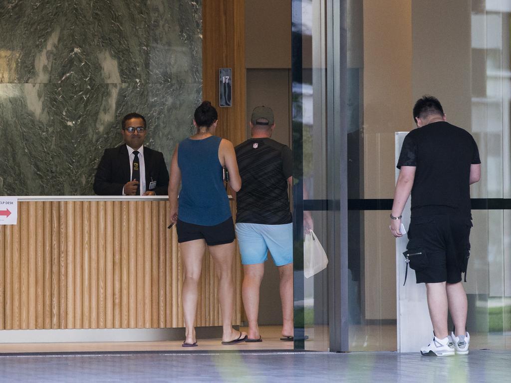 People seen entering Opal Tower on Tuesday. Picture: Dylan Robinson