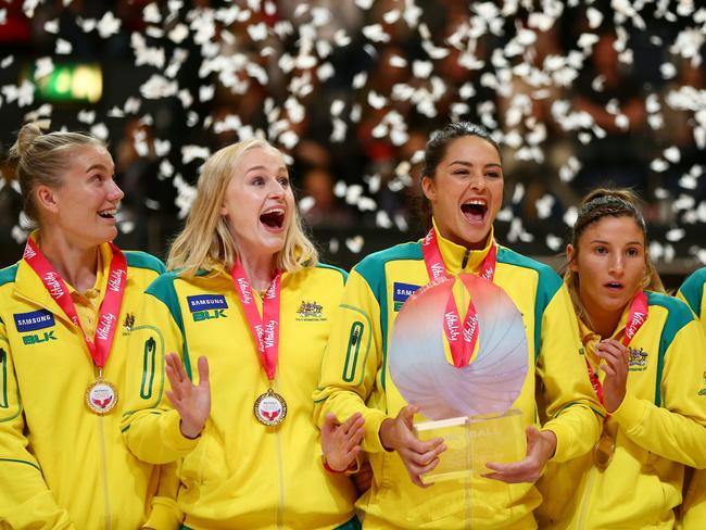 Captain Sharni Leyton (c) lifts the trophy with the Australia team after winning the Quad Series.