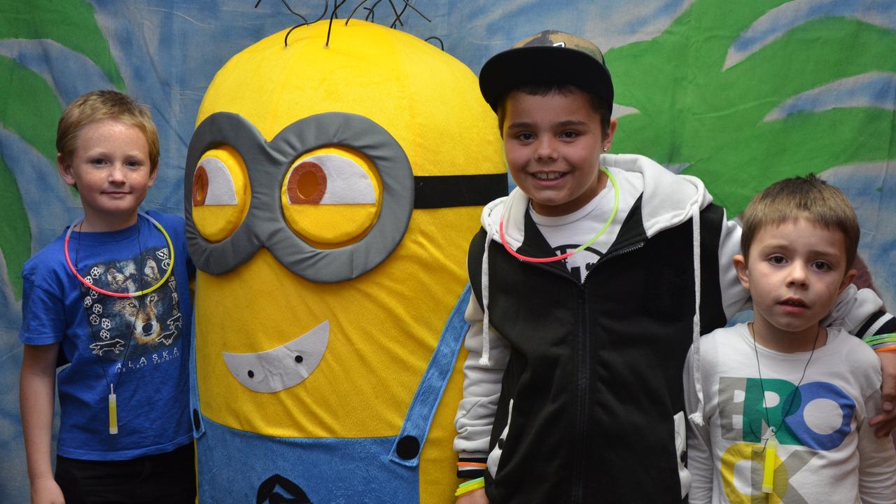 Tyler Shaw, Mack Martin and Tanah Martin pose with Dave the minion at the Stanthorpe Police Blue Light disco on Friday night. Photo Emma Boughen / Stanthorpe Border Post