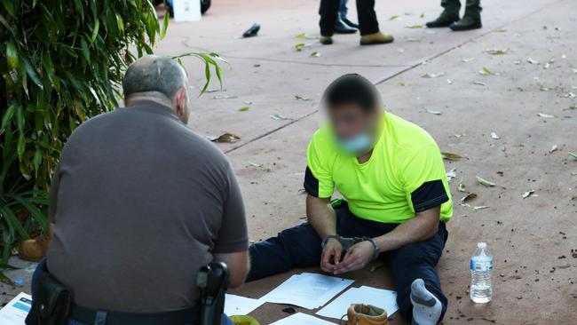 Australian Federal Police arrest a man over an alleged cocaine smuggling operation. Picture: AFP.