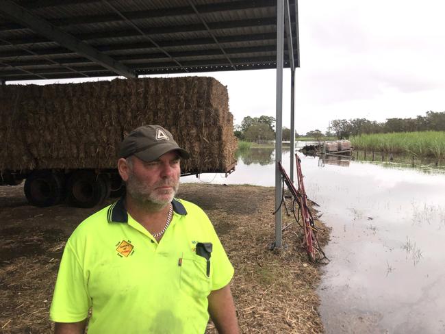 Logan cane farmer Mick Herse on his flooded property after Cyclone Alfred.