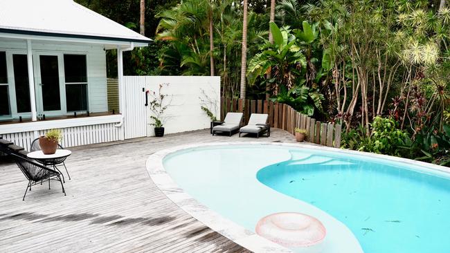 AFTER: A pool was found under the landscaping and renovated to include a huge wooden deck. Picture: Katrina Lezaic