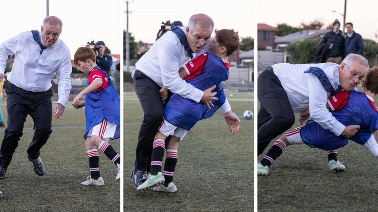 The moment Scott Morrison falls and takes out a child.