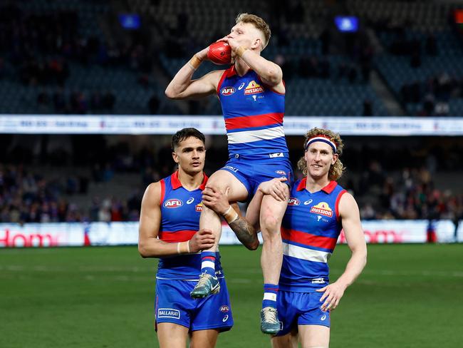 Adam Treloar is chaired off after his 250th game. Picture: Michael Willson/AFL Photos via Getty Images