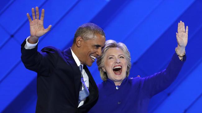 President Barack Obama and Democratic Presidential nominee Hillary Clinton wave to delegates after President Obama's speech during the third day of the Democratic National Convention in Philadelphia , Wednesday, July 27, 2016. (AP Photo/J. Scott Applewhite)