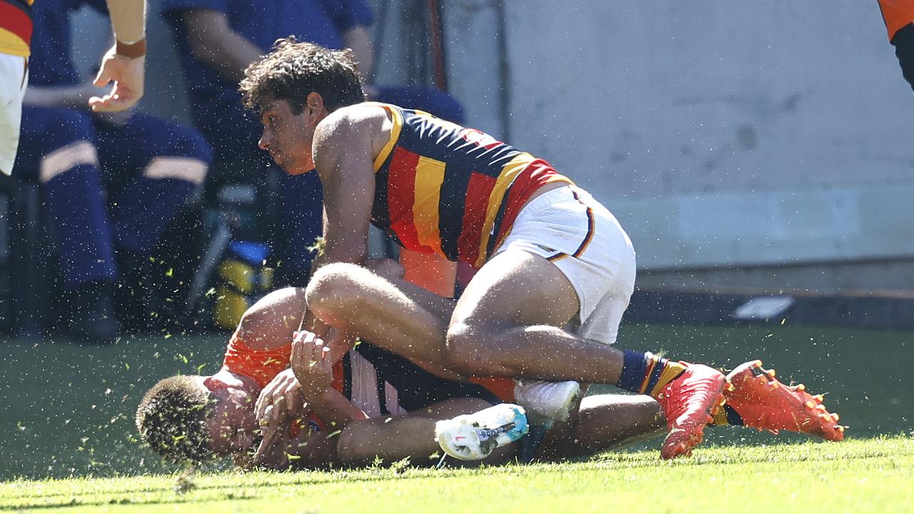 Adelaide's Shane McAdam was suspended for this hit on the Giants’ Jacob Wehr. Picture: Phil Hillyard