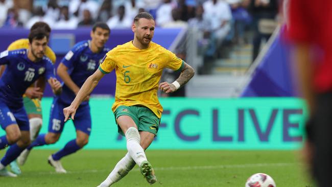 Martin Boyle scores from the penalty spot. (Photo by Giuseppe CACACE / AFP)