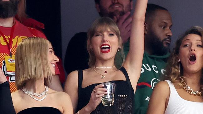 LAS VEGAS, NEVADA - FEBRUARY 11: Rapper Ice Spice, Singer Taylor Swift and Actress Blake Lively react prior to Super Bowl LVIII between the San Francisco 49ers and Kansas City Chiefs at Allegiant Stadium on February 11, 2024 in Las Vegas, Nevada. (Photo by Ezra Shaw/Getty Images)