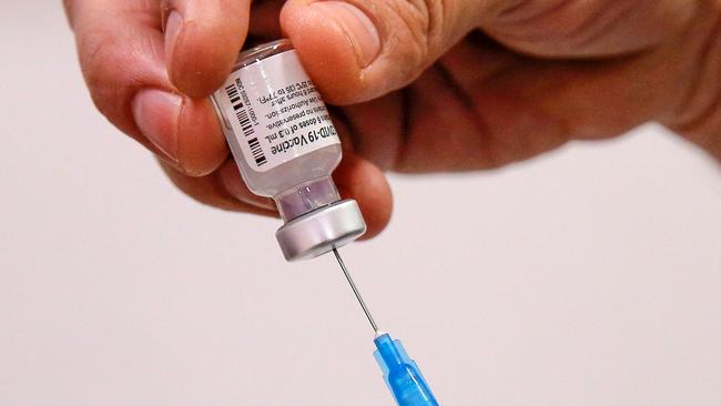 Preparing a Covid vaccine shot. Picture: AFP)