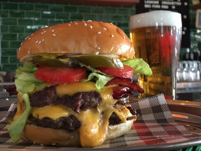 MacDaddy burger with draught beer.