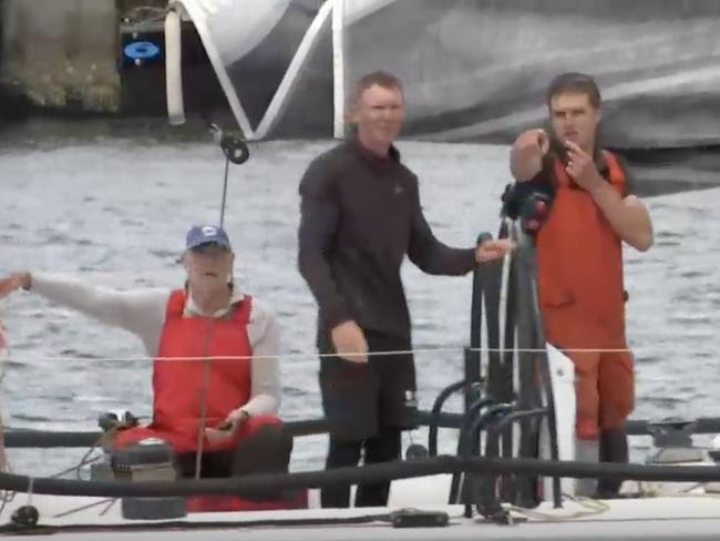 Watkins (middle) was thrown overboard from his yacht, Porco Rosso, in the early hours of Friday morning during the Sydney to Hobart yacht race. Picture: ABC News