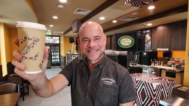 Zarraffa’s Coffee boss Kenton Campbell, checking over the final details of the new Molendinar store. Picture: Glenn Hampson