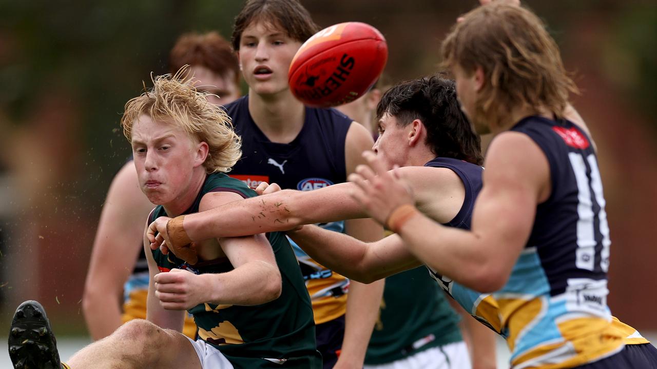 Tasmania’s Marty Brereton tries to get a kick away against the Bendigo Pioneers on Saturday. Picture: Getty Images