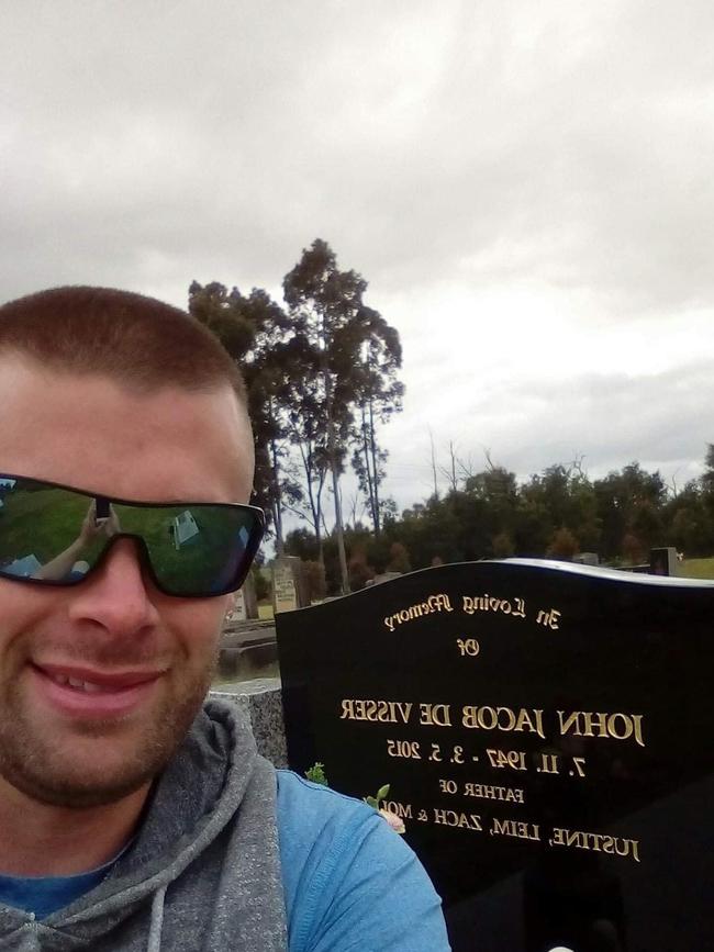 Zach De Visser at his father’s grave. Picture: Supplied.