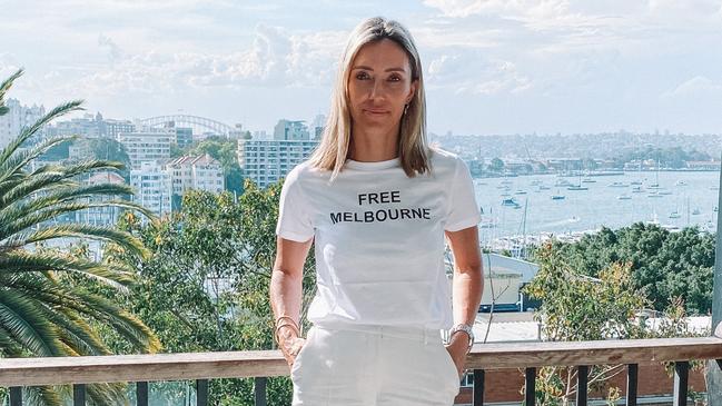 Suzy Eskander dons a Free Melbourne T-shirt.