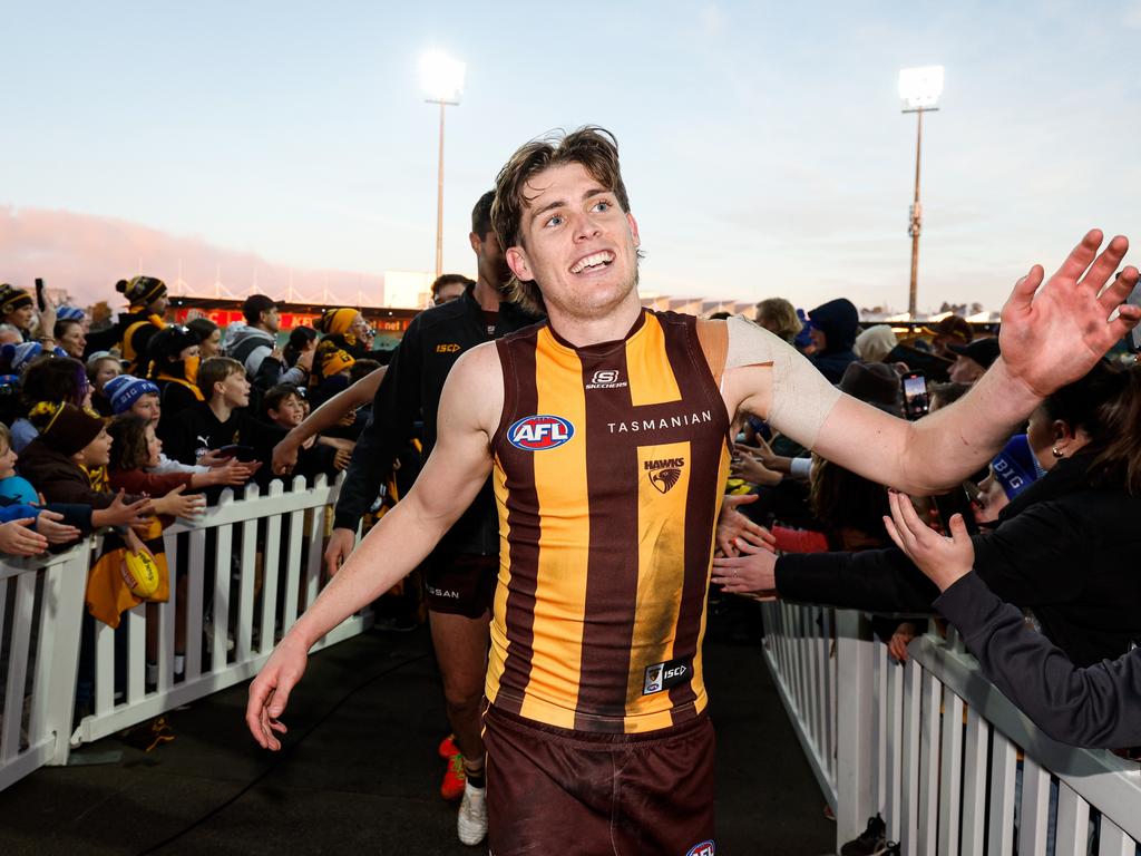 MELBOURNE, AUSTRALIA - JUNE 08: Will Day of the Hawks leaves the field after a win during the 2024 AFL Round 13 match between the Hawthorn Hawks and the GWS GIANTS at UTAS Stadium on June 08, 2024 in Launceston, Australia. (Photo by Dylan Burns/AFL Photos via Getty Images)