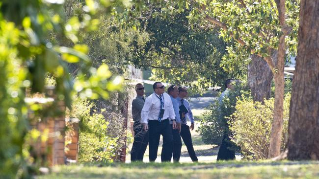 Investigators at the South Toowoomba crime scene following the house fire on Monday, December 16, 2019. Picture: Kevin Farmer