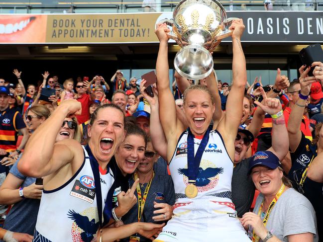 Chelsea Randall and Erin Phillips celebrate winning the Women's AFLW Grand Final between the Brisbane Lions and Adelaide Crows at Metricon Stadium on the Gold Coast. Pics Adam Head