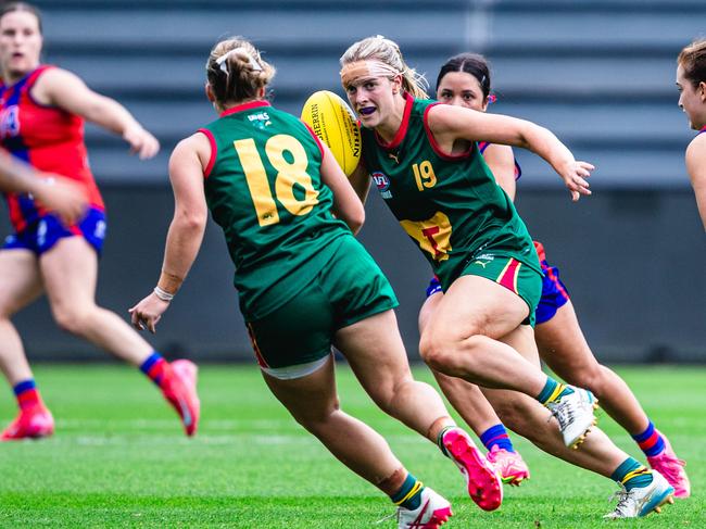 Tasmania Devils pathway player Emilie Saward looks to pass the ball at UTAS Stadium, Launceston against Port Melbourne. Picture: Linda Higginson/Solstice Digital