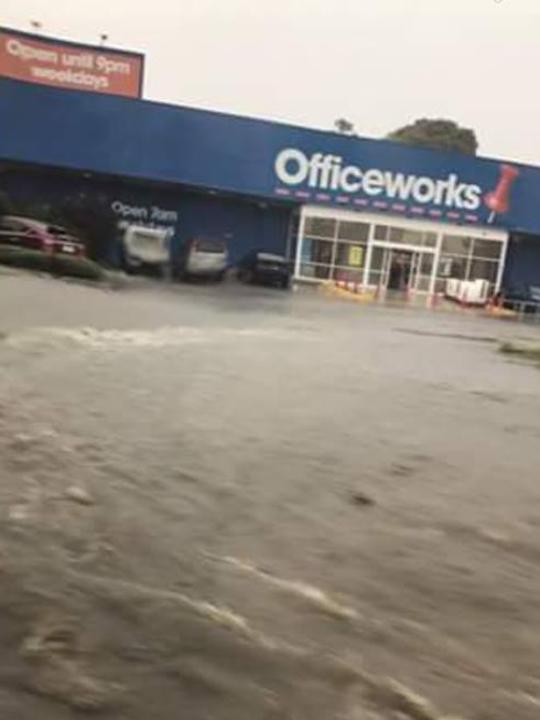 The car park at Officeworks in Chirnside Park became a fast flowing river while lanes were closed on nearby Maroondah Highway.