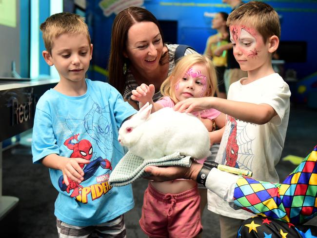 Reef HQ Aquarium's farewell party before they close for renovations. Julia Brink with kids Willem 7, Finley 4 and Eli 7 with Stewit the Rabbit and  Windy Wizard Picture: Alix Sweeney