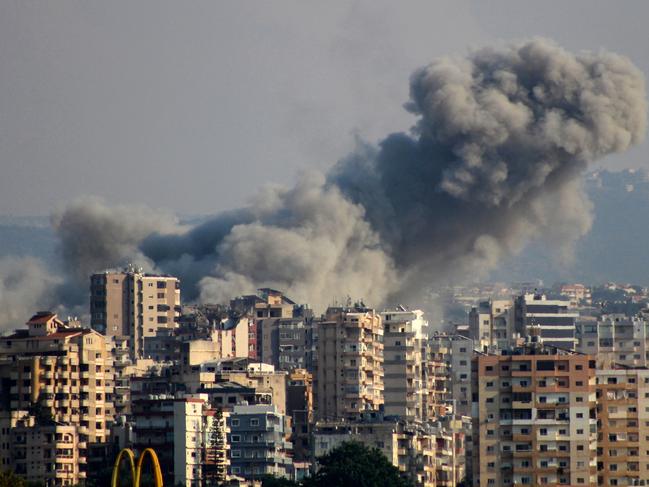 TOPSHOT - Smoke rises from the site of an Israeli airstrike that targeted the area of al-Hosh, on the outskirts of Tyre in southern Lebanon, on October 31, 2024, amid the ongoing war between Israel and Hezbollah. (Photo by Kawnat HAJU / AFP)