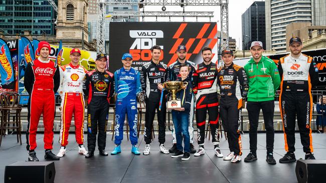 Supercar drivers pose with No.1 ticket holder Jake Burton and the trophy at the official launch of the VALO 2022 Adelaide 500. Picture: Daniel Kalisz/Getty