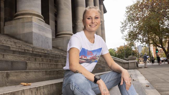 Grace Tame outside South Australian parliament, where changes to the wording of child sex abuse laws have passed both houses. Picture: NCA NewsWire/ Kelly Barnes