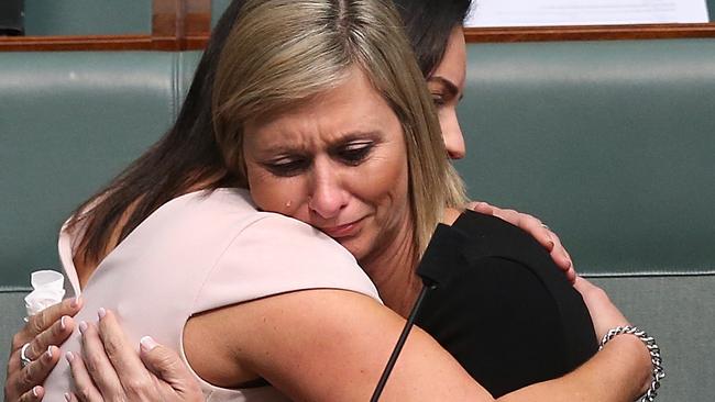 Susan Lamb embraced after making a statement to the House of Representatives. Picture: Kym Smith.