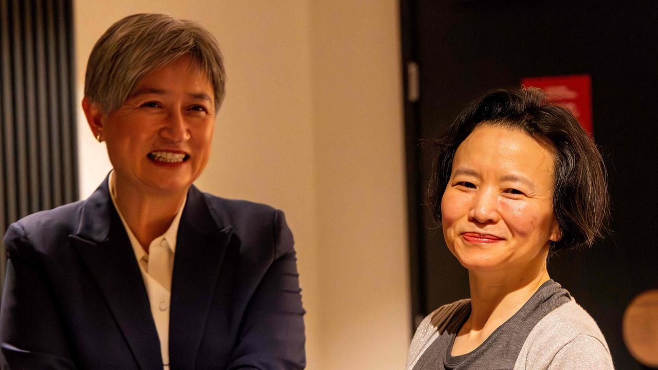 Foreign Minister Penny Wong and Australian journalist Cheng Lei. Picture: AFP