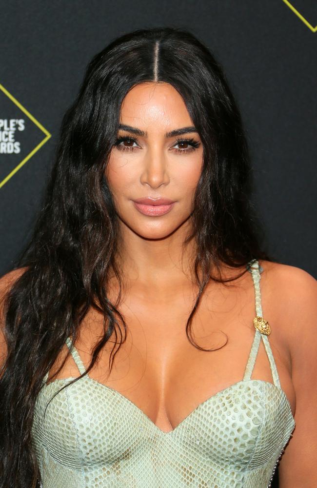 Kim Kardashian is worth $US900 million ($A1.15 billion), making her the equal richest Kardashian Jenner. Picture: AFP