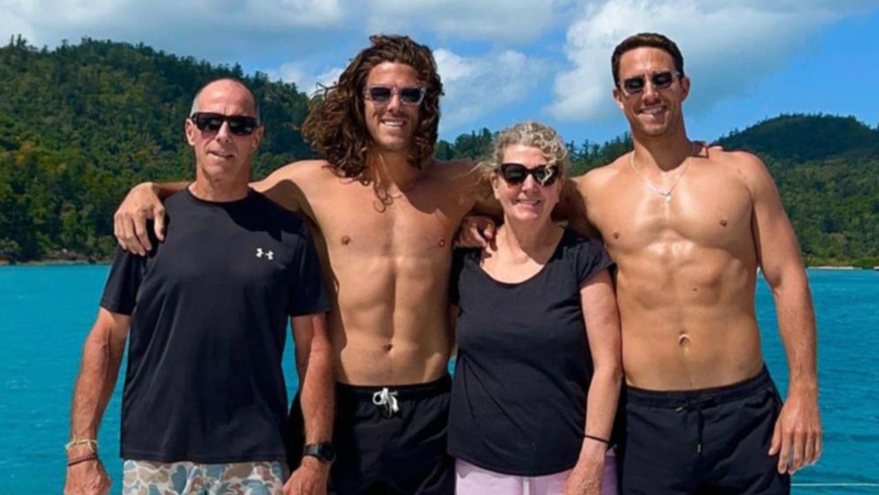 The brothers with their parents, Martin and Debra.