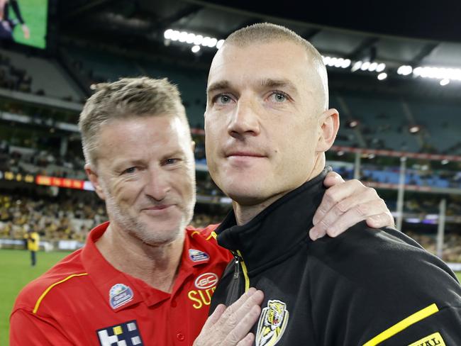 NCA. MELBOURNE, AUSTRALIA. August 24,   2024. AFL Round 24. Richmond vs Gold Coast Suns at the MCG.   Richmonds Dustin Martin  hugs old coach Damien Hardwick on the MCG during his lap of honour   . Pic: Michael Klein