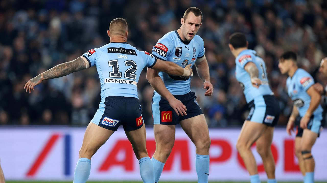 Isaah Yeo stumbles after being whacked in the opening tackle. Picture: Getty