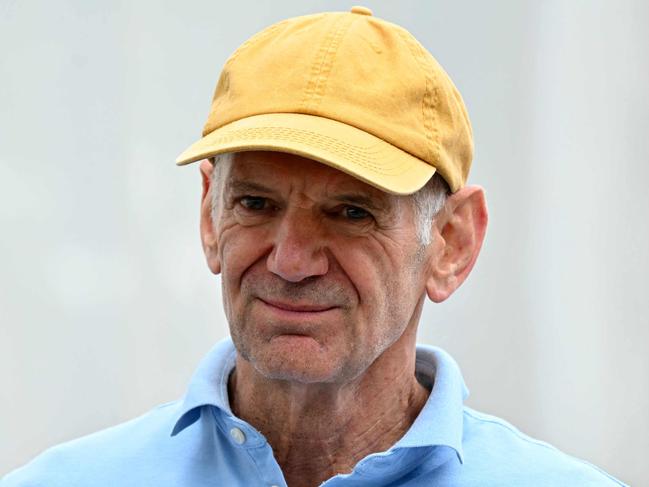 Red Bull Racing's technical chief Adrian Newey arrives in the pits of the Circuit de Monaco before the second practice session of the Formula One Monaco Grand Prix on May 24, 2024, two days ahead of the race. (Photo by ANDREJ ISAKOVIC / AFP)