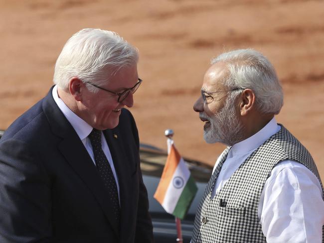 German President Frank Walter Steinmeier speaks with Indian Prime Minister Narendra Modi, right, during a ceremonial reception at the Indian presidential palace in New Delhi, India, Saturday, March 24, 2018. Steinmeier is on a four-day state visit to India. (AP Photo)