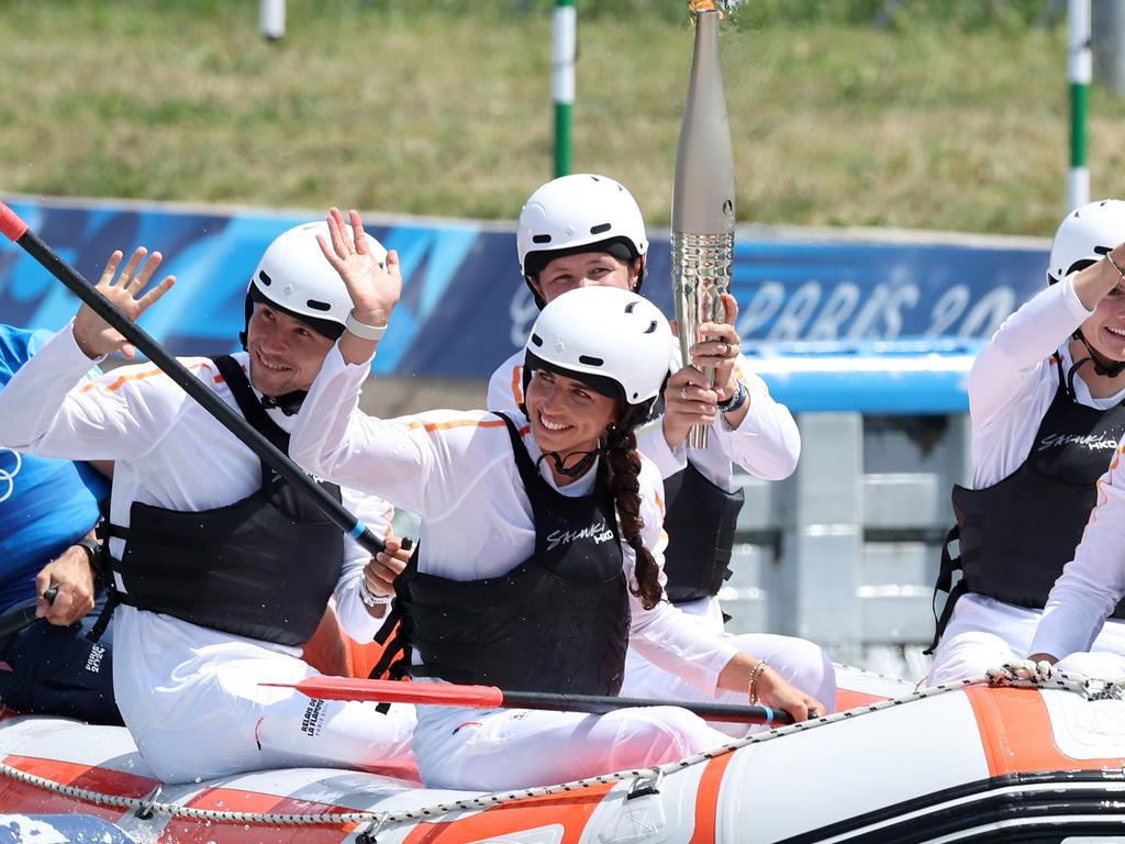 Australian Olympic Canoe Slalom star Jess Fox takes part in the Paris Torch relay at Vaires-sur-Marne Nautical Stadium. Picture: Adam Head