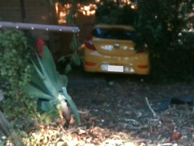 A 66-year-old woman has crashed through a fence and house on Watson Ave. Picture: SAPOL