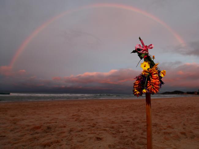 Tributes are seen at Palm Beach where Australian Winter Olympic Games Snowboarder Alex Chumpy Pullin died earlier today, on July 08, 2020 in Gold Coast, Australia. Pullin reportedly passed away after a drowning incident while spearfishing, aged 32. (Photo by Chris Hyde/Getty Images)