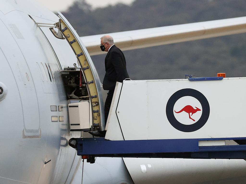 PM Scott Morrison boards a RAAF aircraft in Canberra on his way to theG20 in Rome and the COP 26 UN Climate Change Conference in Glasgow. Picture: NCA NewsWire