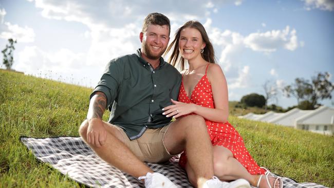 Cody Taylor and Peta Watson say their engagement was unintentionally fast-tracked by COVID. Picture: Christian Gilles