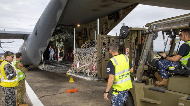 A pallet of humanitarian stores bound for PNG is loaded onto a Royal Australian Air Force aircraft at Nowra, New South Wales. Picture: ADF